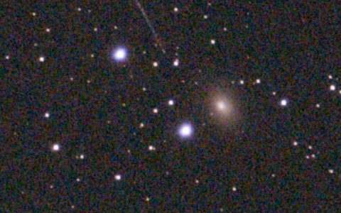 Before: the end of the trail stops just short of the small galaxy NGC 3077