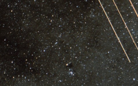 Before: three parallel orange lines from a plane cross the stars of the Milky Way