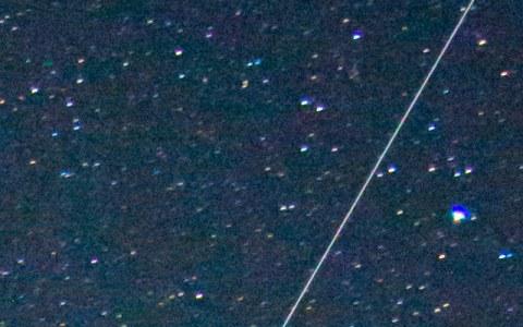 Before: a long bright streak crosses the stars